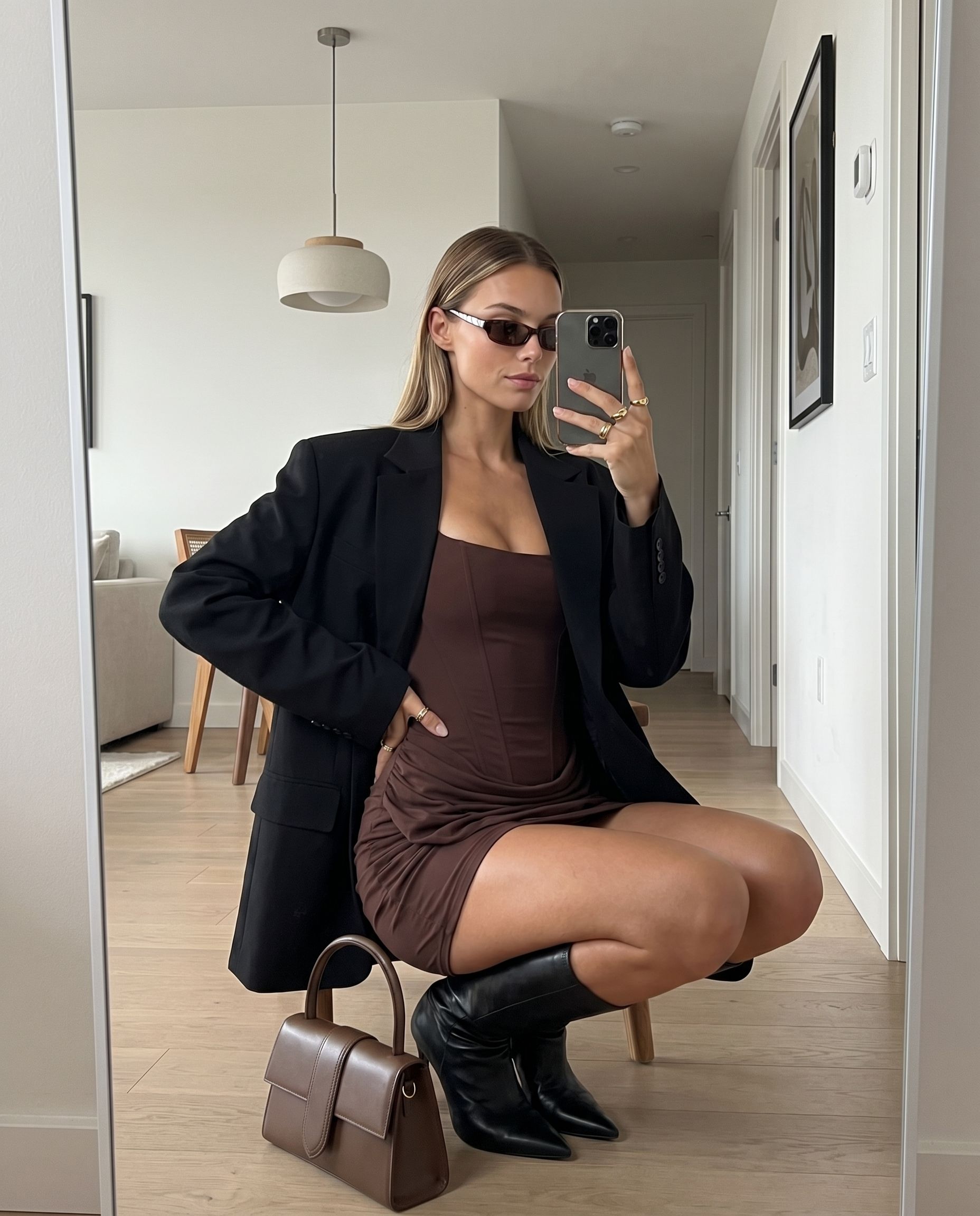 AI mirror-selfie visual of a brown dress for Instagram and TikTok